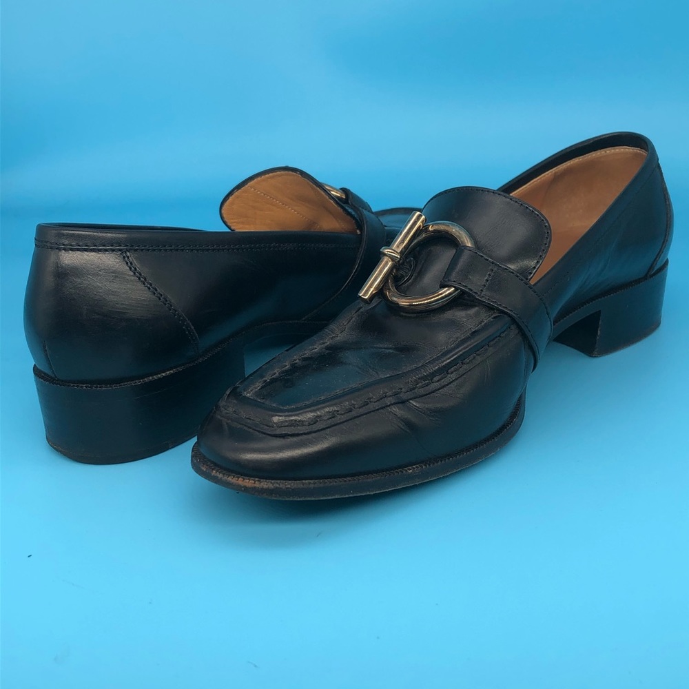 Vintage Hermès black leather loafers. Toggle ring